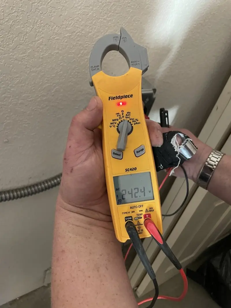 Voltage testing with clamp meter during Outlet Installation in North Hartsville